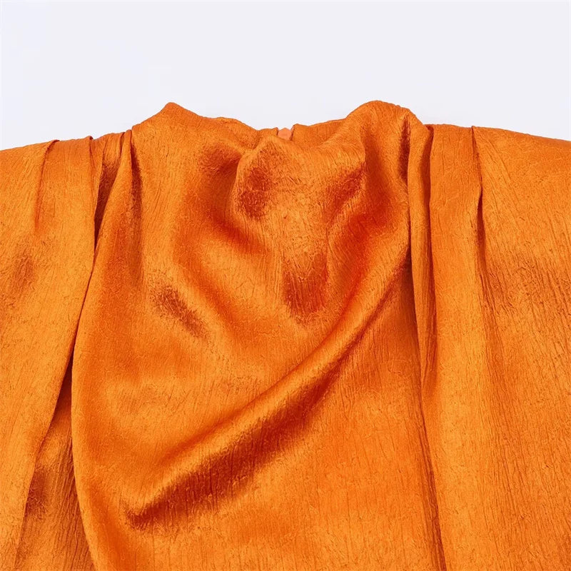 Top Elegante con Detalle de Cinta