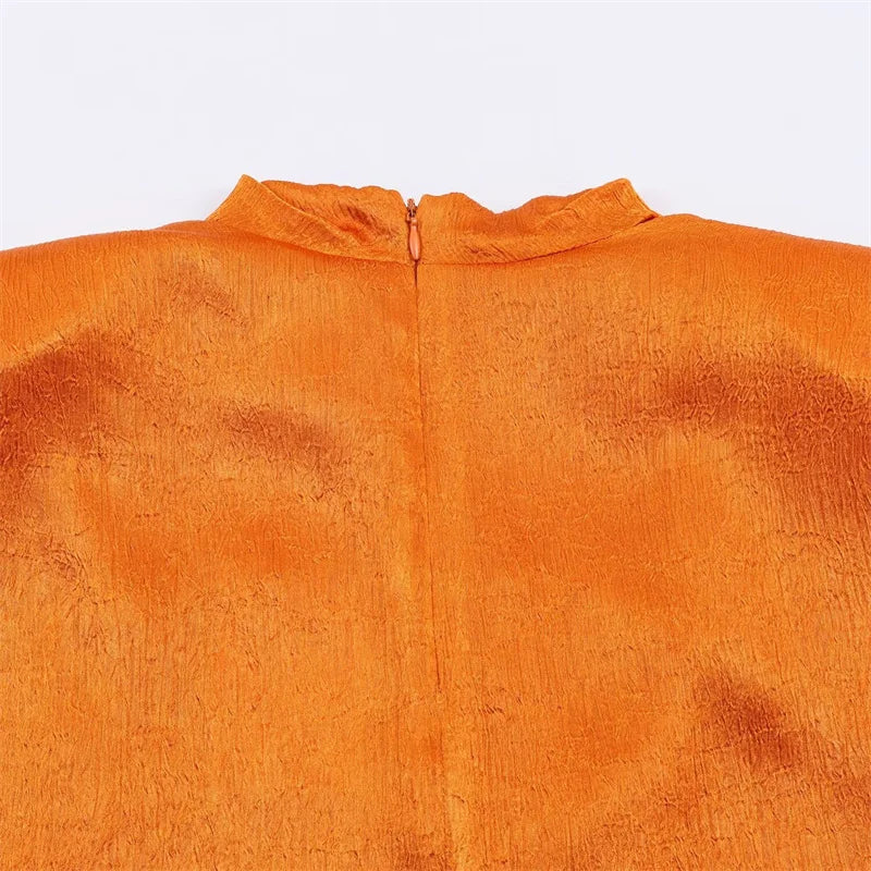 Top Elegante con Detalle de Cinta